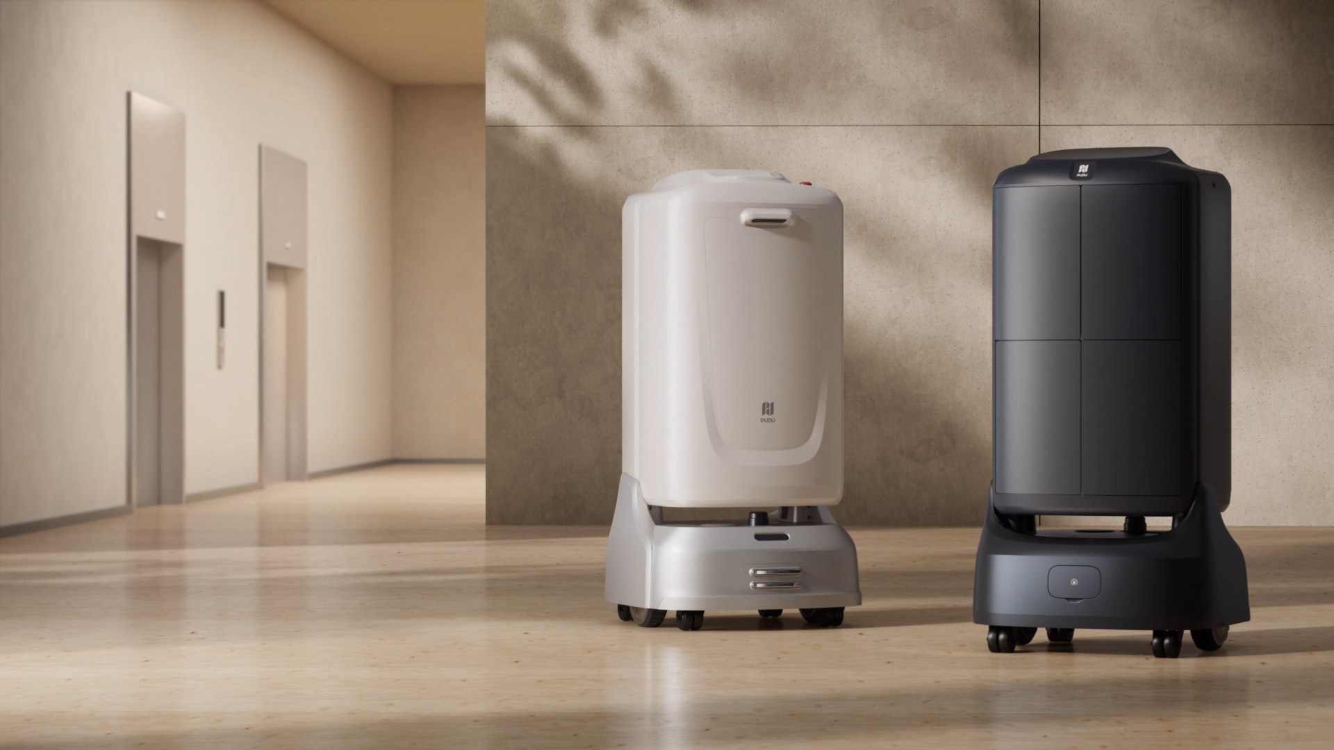 Hai robot vận chuyển khoang kín chờ tại khu vực thang máy