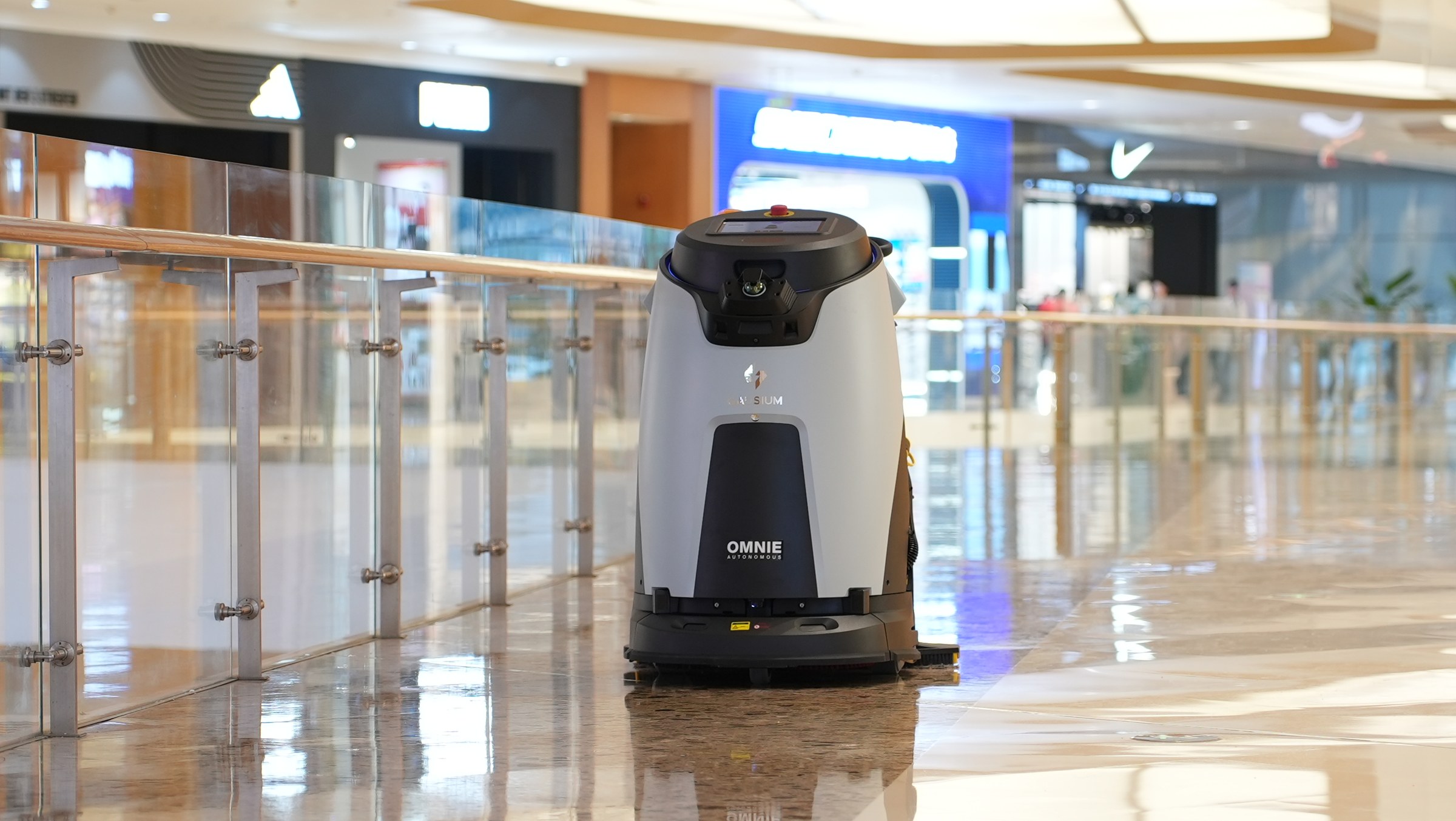 Robot Omnie lau sàn dọc hành lang dài theo lộ trình cố định
